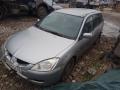 Фара левая MN161673 MITSUBISHI LANCER 9 03-